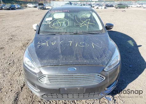 2018 Ford Focus Titanium z USA, uszkodzony, nr VIN 1FADP3N21JL262656